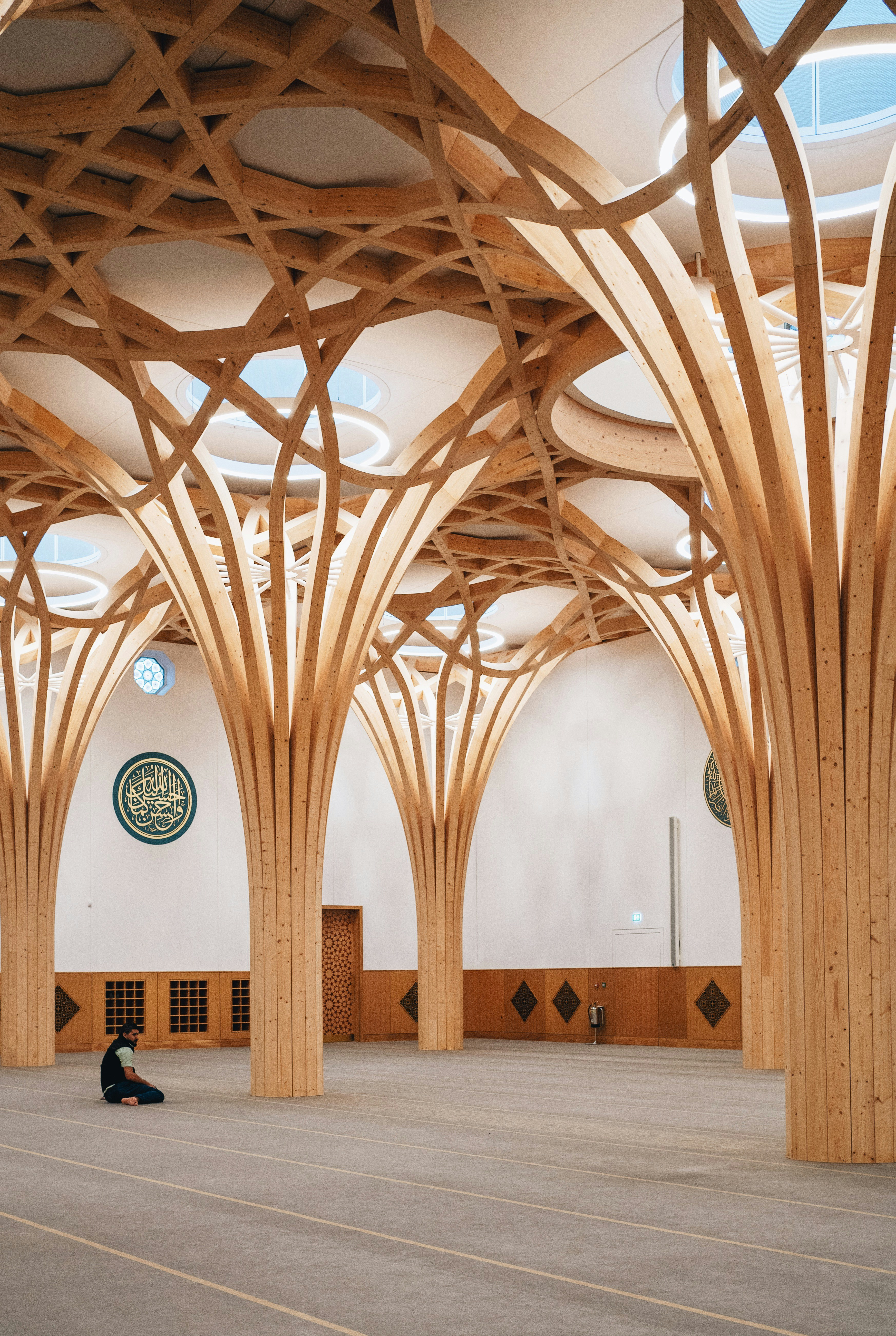 Library with bookshelves containing Islamic literature